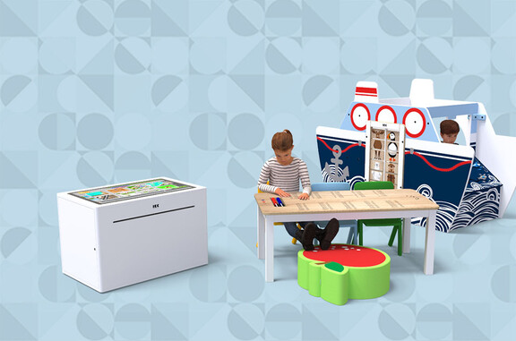 this image shows a kids corner with interactive play table and play house